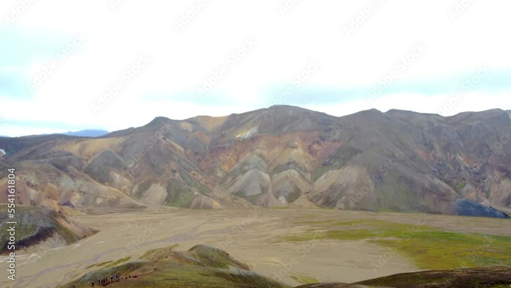 Rainbow mountain valley surrounded by lava fields in Landmannalaugar - Icelandic Highlands
drone shot Rainbow mountain valley surrounded by lava fields in Landmannalaugar - Icelandic Highlands
drone shot