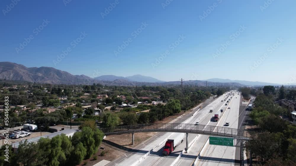 Aerial View of Traffic on American Interstate Highway 210 by Residential Neighborhood of Los Angeles USA Aerial View of Traffic on American Interstate Highway 210 by Residential Neighborhood of Los Angeles USA