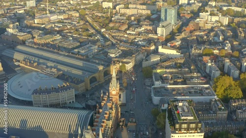 Descending aerial shot of St Pancras clock tower and Euston road London photo