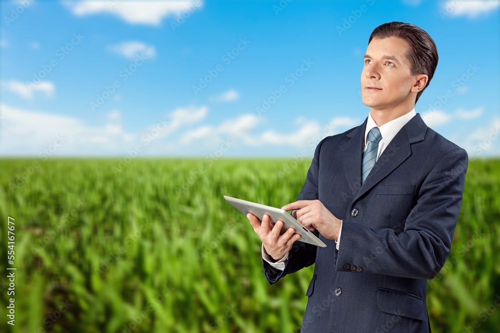 Agronomist worker on agricultural field plantation Agronomist worker on agricultural field plantation