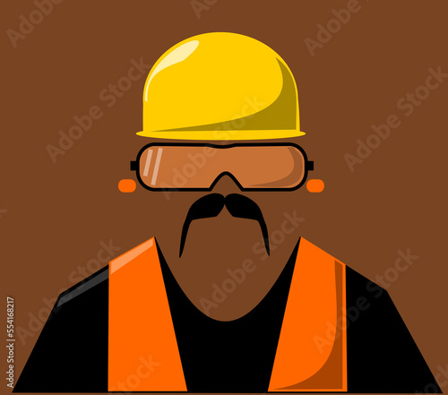 Construction worker wearing safety goggles, hard hat and earplugs