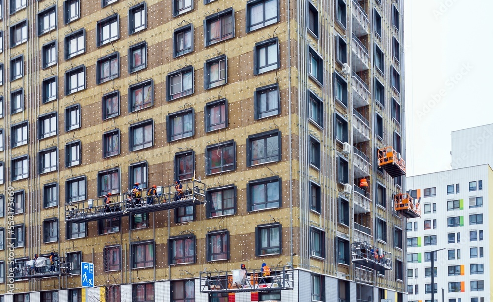 Repair of the walls of a high-rise building Repair of the walls of a high-rise building