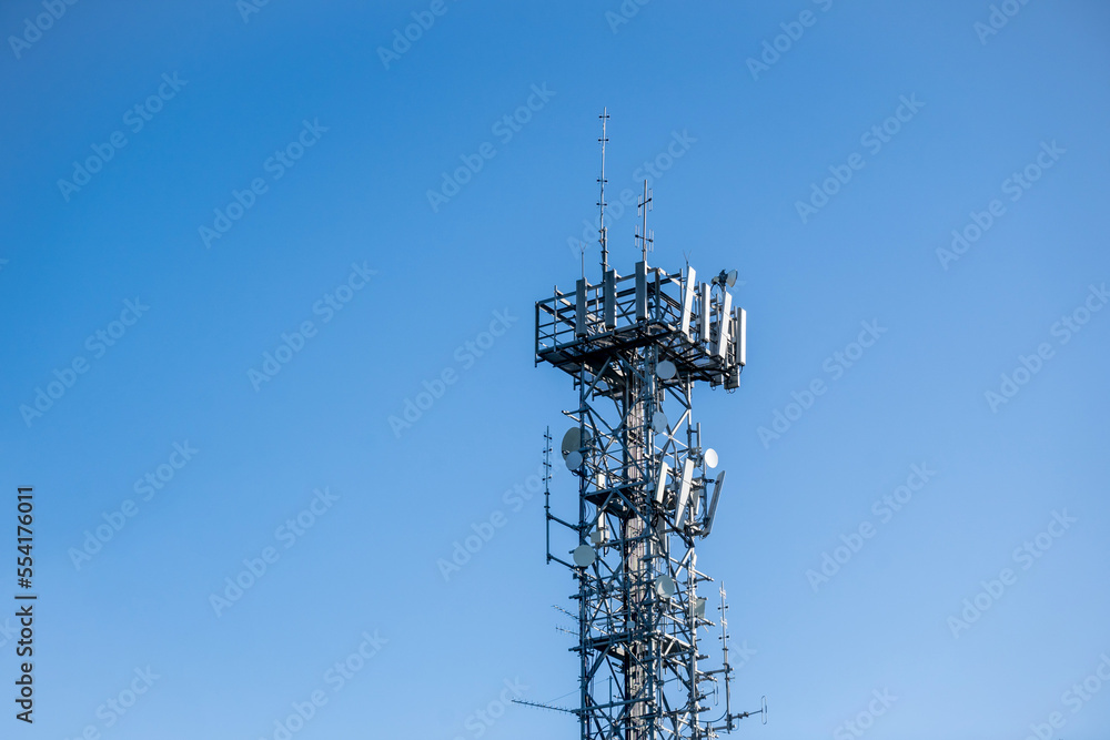 Radio, communication and cell tower on blue sky background. Australia Radio, communication and cell tower on blue sky background. Australia