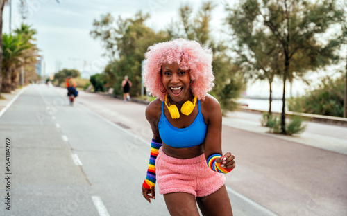 Beautiful woman skating with roller skates and having fun. photo