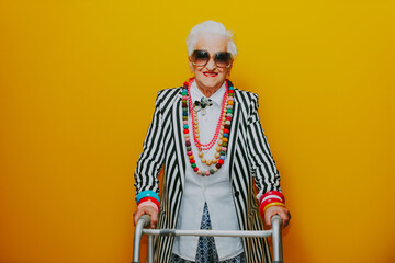 Funny grandmother portraits. Senior old woman dressing elegant for a special event. granny fashion model on colored backgrounds