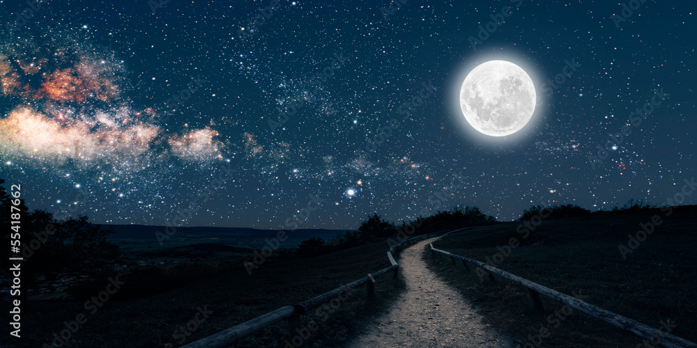 Fototapeta premium The moon shines over the manger of christmas of Jesus Christ.