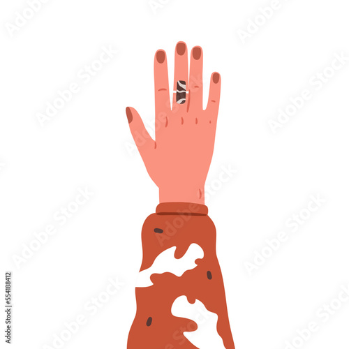 Women hand raised up with chic ring on finger. Female arm with classy gem sto...