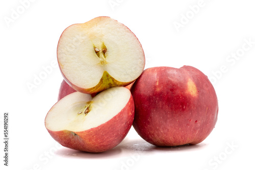 Red Apple isolated on a white background. Half cut apple. Clipping Path. Full depth of field. close up