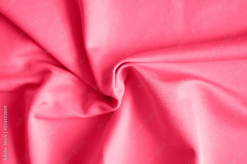 microfiber fabric pink color background with pleats, top view. toned in viva magenta, trend color of the year 2023 microfiber fabric pink color background with pleats, top view. toned in viva magenta, trend color of the year 2023