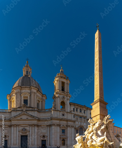 the Fountain of the Four Rivers and Agone Obelisk with the Sant'Agnese Church in warm evening light