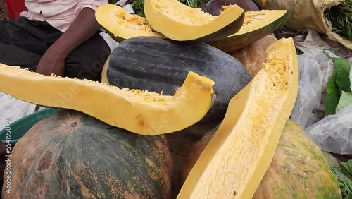 Pumpkin, fresh and young pumpkins in the marketplace of India. Pumpkin. This is very common vegetable in Asian and American continents. It is also widely used in the Halloween festival photo