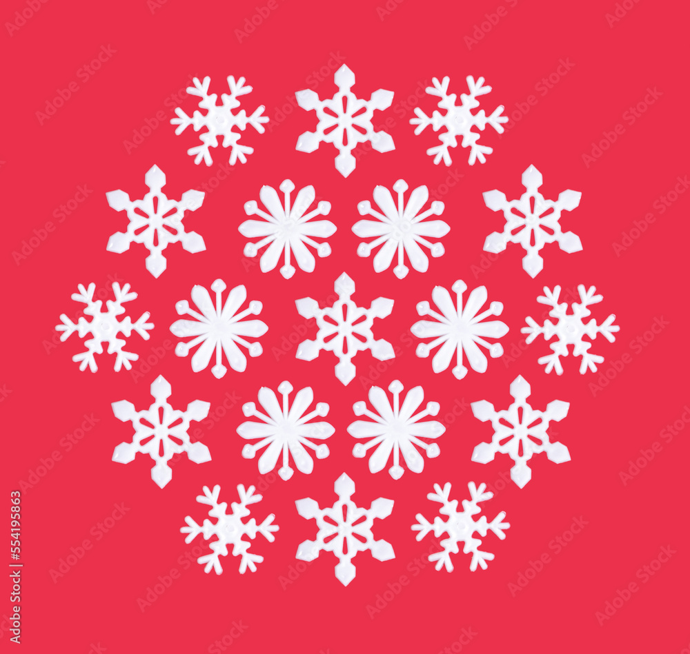 Decorative snowflakes on pastel red background Decorative snowflakes on pastel red background