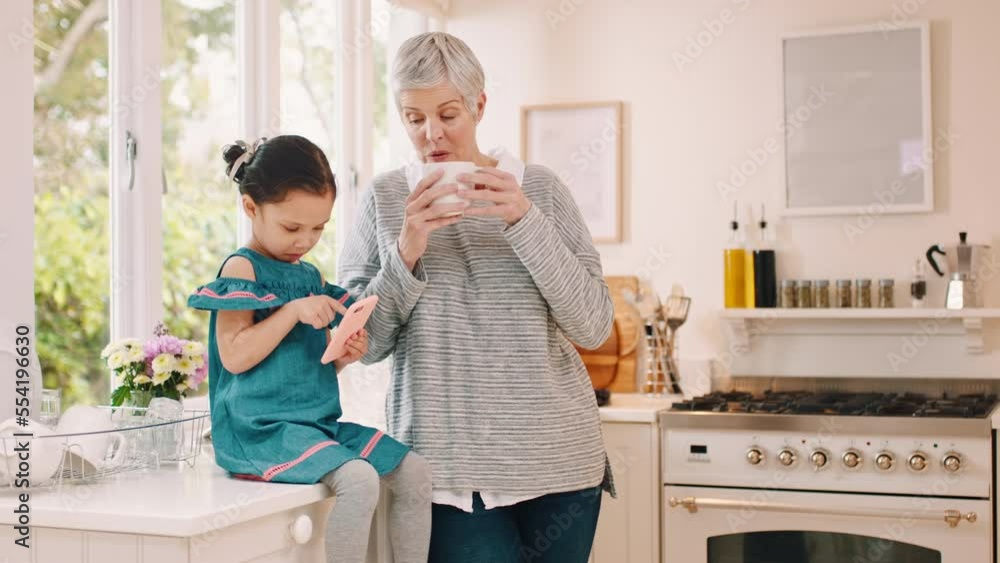 Education, social media and child with grandmother and phone for communication, cartoon and search on the internet. Contact, typing and girl reading on a mobile app while talking to a senior woman Education, social media and child with grandmother and phone for communication, cartoon and search on the internet. Contact, typing and girl reading on a mobile app while talking to a senior woman