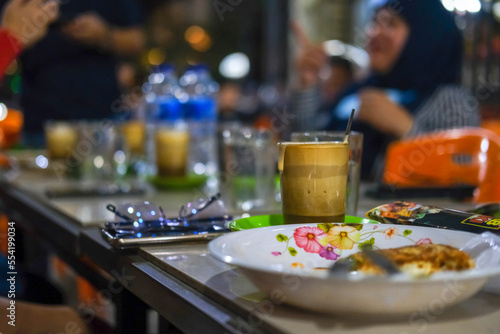 a typical coffee shop drink in Banda Aceh, a drink made from eggs stirred with honey and ginseng