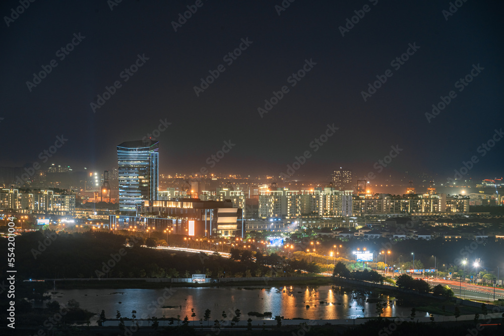 HO CHI MINH, VIETNAM - November 11, 2022: Ho Chi Minh City at night, view to District 2, Thu Duc City, light trail, landmark 81