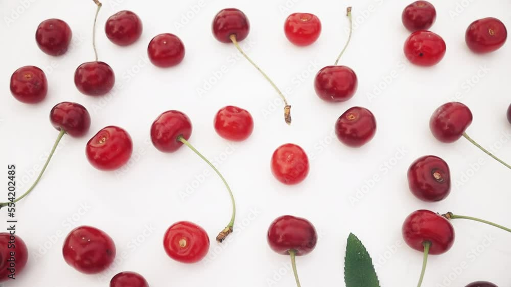 red cherries lie patern on a white background red cherries lie patern on a white background