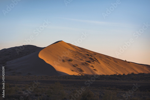 Singing dune at sunset in Altyn Emel National Park. Kazakhstan