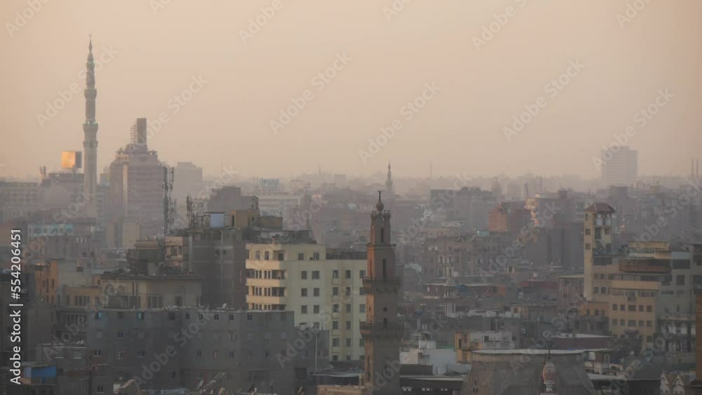 View Of The Houses And Mosques Of The Large City In The Evening Haze (Cairo, Egypt) View Of The Houses And Mosques Of The Large City In The Evening Haze (Cairo, Egypt)
