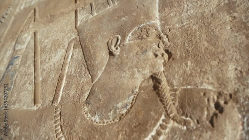 A Relief Image Of A Pharaoh On The Stele Of An Ancient Egyptian Temple