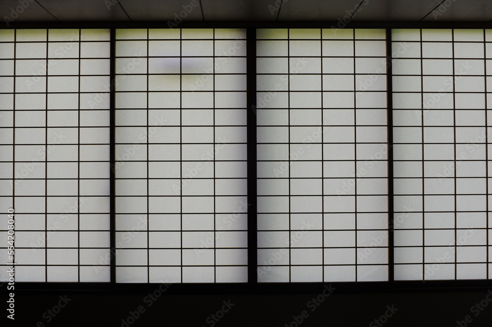 Rectangular and square Japanese shoji paper window frame with partitions  with light in Japan Stock Photo
