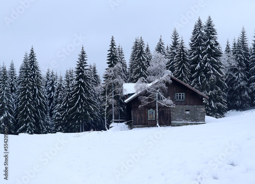 snowy mountain hut, winter landscape
