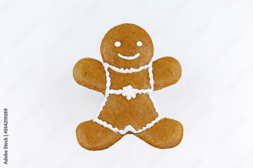 Smiling gingerbread man isolated on a white background Smiling gingerbread man isolated on a white background