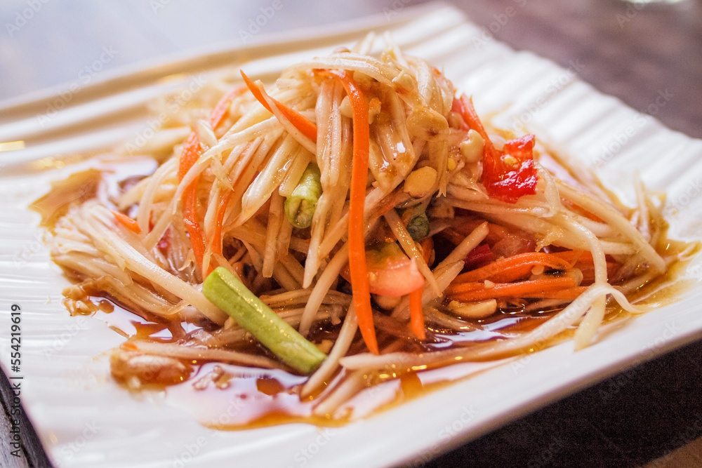 Thai papaya salad , Somtam (Street food), with roasted chicken and fresh Thai papaya salad , Somtam (Street food), with roasted chicken and fresh