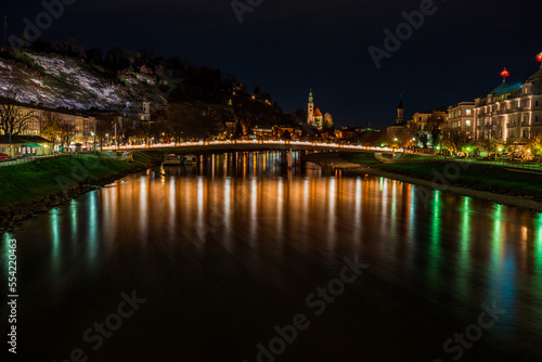 Night view across the River Salzach in Salzburg, Austria