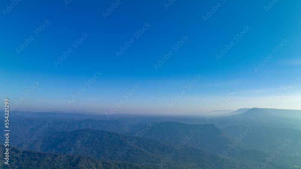 Sky blue background. Sky cloud clear over the mountain range at the west of Thailand in late autumn 