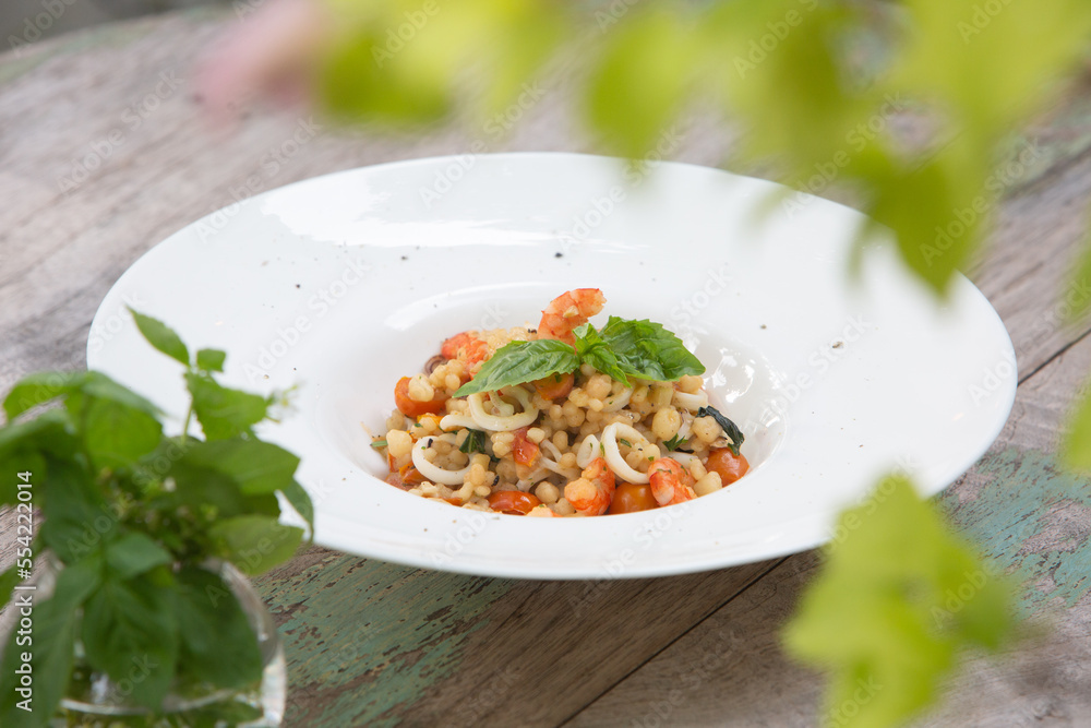 seafood risotto and wood table seafood risotto and wood table