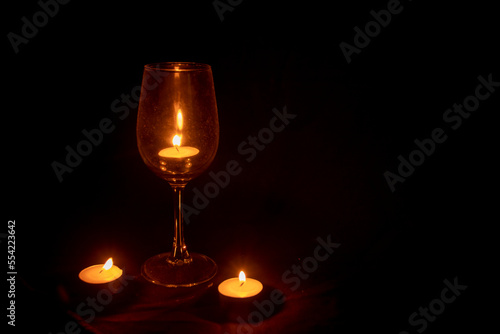 ไปที่หน้า |1234ถัดไป Candle in glass and surrounded by candles. Selective focus.