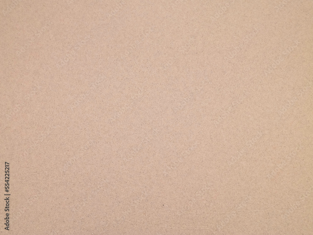 Obraz premium Sea water on sandy beach sand - nature background.