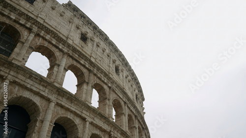 Bottom view of the Colosseum in Rome , Italy. Action. Ancient Rome architecture, concept of tourist attractions.