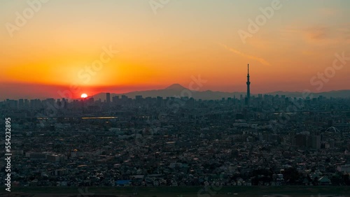 Timelapse video of Tokyo Skytree Christmas tree illumination and greater tokyo magic hour with Mt. Fuji silhouette. photo