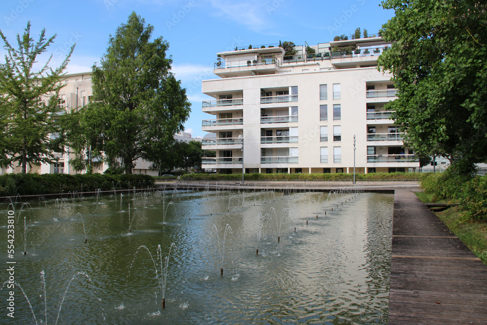 Fototapeta premium modern flat buildings and pond in nancy (france)