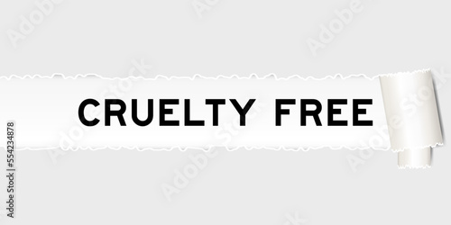 Ripped gray paper background that have word cruelty free under torn part