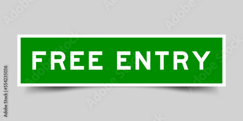 Sticker label with word free entry in green color on gray background