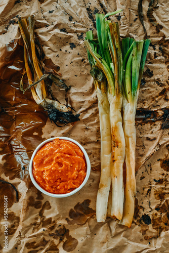 calcots and romesco sauce typical of Catalonia, Spain photo