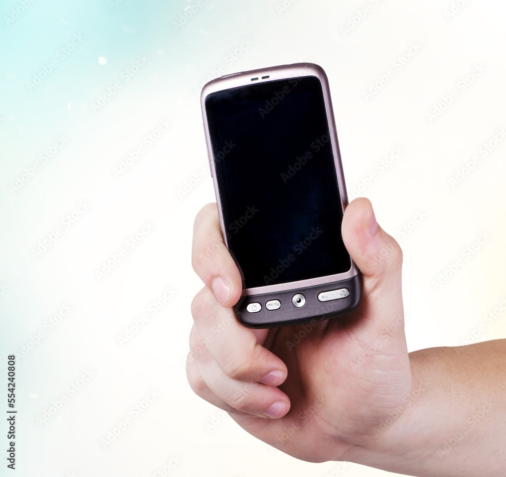 Hand hold modern smart phone with a blank screen Hand hold modern smart phone with a blank screen