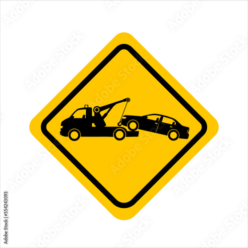 Sign of a tow truck yellow in the form of a rhombus. Warning tow away zone sign. Tow truck yellow road sign. Towing truck van with car. Vector isolated flat illustration.