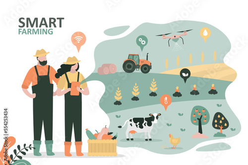 Modern agriculture technology for good harvest. Smart farming concept. Couple of farmers controlling remotely innovation farm. Countryside, farmland view.