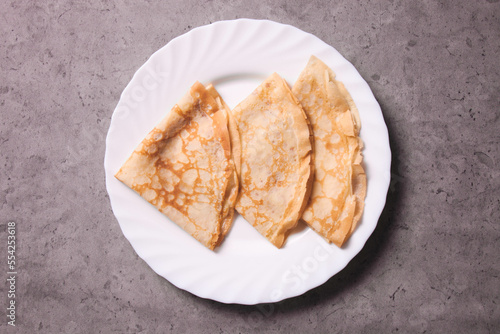Thin pancakes on plate