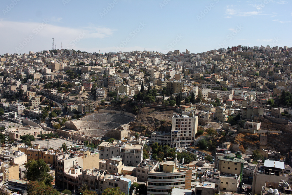 Panorama view of Roman theater in capital city Amman, view from citadel, Jordan 