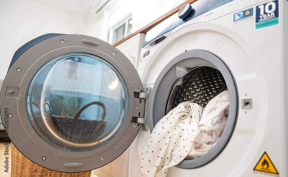 Close-up laundry washing machine in home , health care lifestyle concept Close-up laundry washing machine in home , health care lifestyle concept