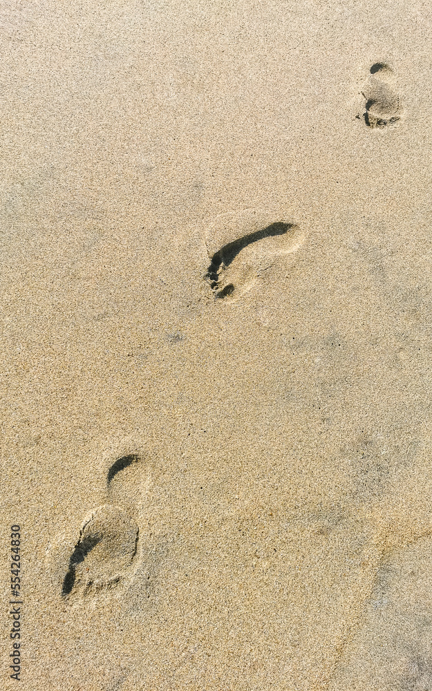Footprint footprints on the beach sand by the water Mexico. Footprint footprints on the beach sand by the water Mexico.