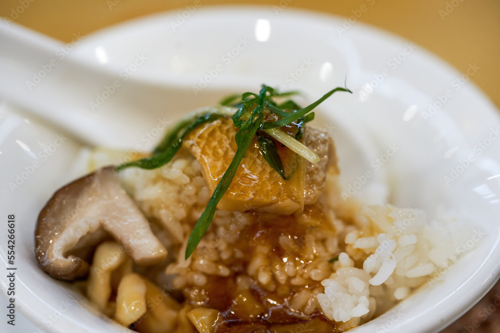 A bowl of delicious steamed fish slices with rice A bowl of delicious steamed fish slices with rice