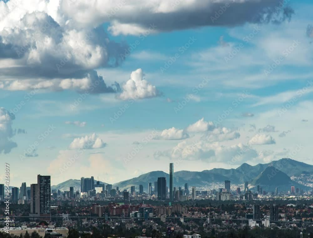 Timelapse of a panoramic view of Mexico city. Cityscape of Mexico city at sunny and cloudy day. Timelapse of a panoramic view of Mexico city. Cityscape of Mexico city at sunny and cloudy day.