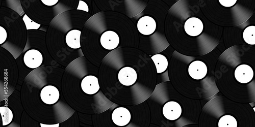 Seamless pile or stack of vintage black lp vinyl records with blank white labels. Retro 60s, 70s or 80s music backdrop, DJ disc jockey or recording industry concept background pattern. 3D rendering