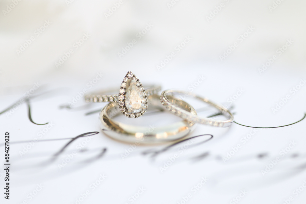 Bride diamond wedding ring and engagement band in a invitation Bride diamond wedding ring and engagement band in a invitation