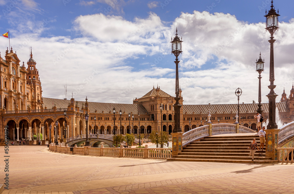 Fototapeta premium Nobody walking near fountain at the Spain Square Plaza de Espana in Seville city, Andalusia, Spain. Example of Moorish and Renaissance revival